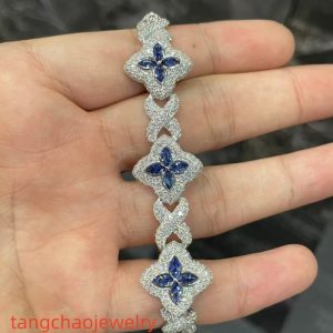 VVS Moissanite 925 Sterling Silver Miami Bracelet 9mm 8 inches, set with blue gemstones.