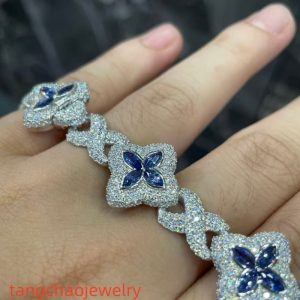 VVS Moissanite 925 Sterling Silver Miami Bracelet 9mm 8 inches, set with blue gemstones.