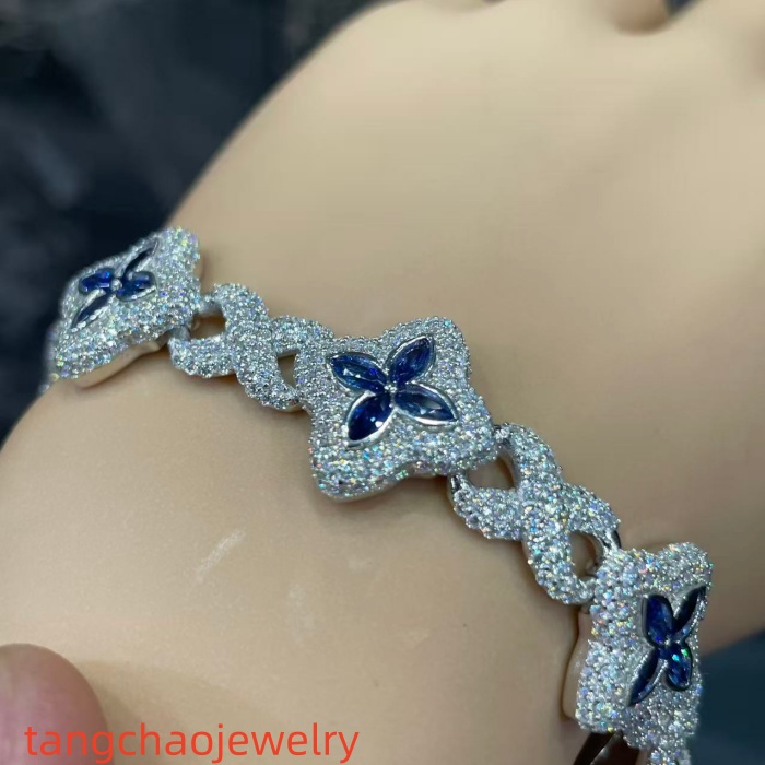 VVS Moissanite 925 Sterling Silver Miami Bracelet 9mm 8 inches, set with blue gemstones.