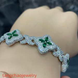 VVS Moissanite 925 Sterling Silver Miami Bracelet 9mm 8 inches, set with green gemstones.