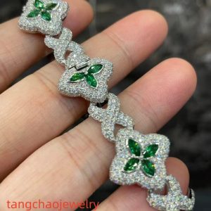 VVS Moissanite 925 Sterling Silver Miami Bracelet 9mm 8 inches, set with green gemstones.