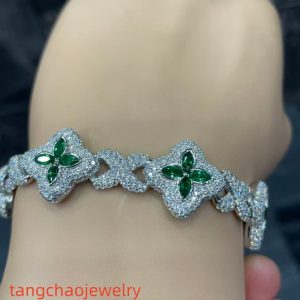 VVS Moissanite 925 Sterling Silver Miami Bracelet 9mm 8 inches, set with green gemstones.